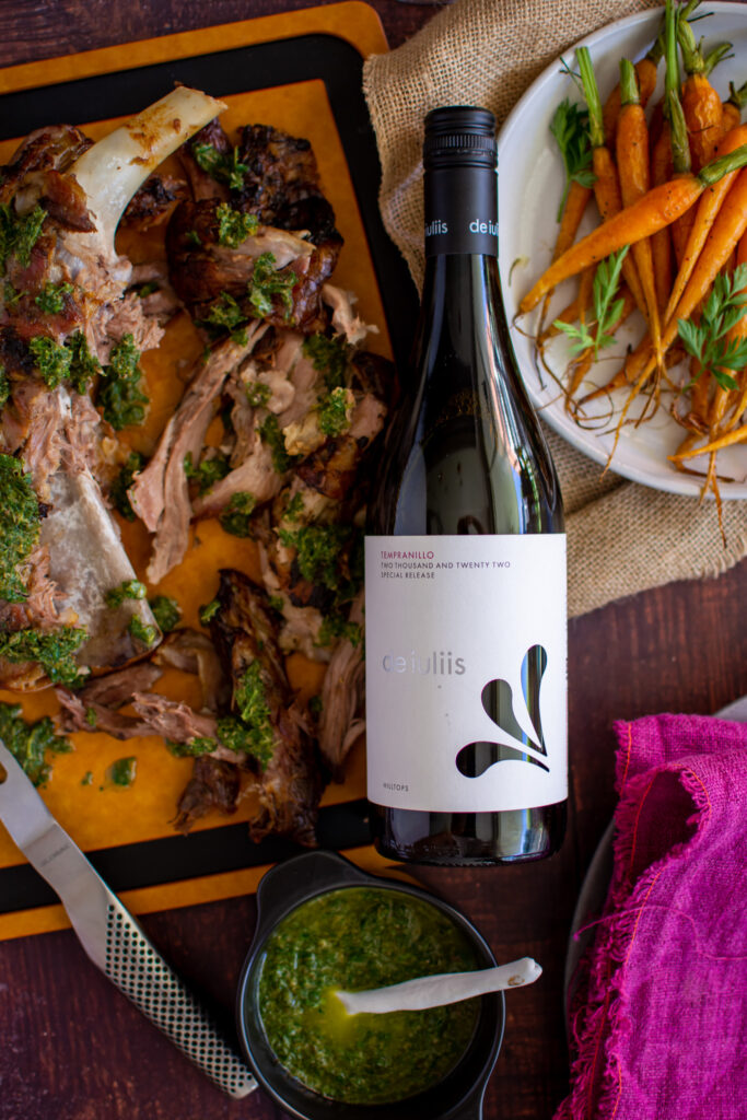 A bottle of De Iuliis Hunter Valley Tempranillo with slow cooked lamb shoulder